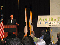 mayor Newsom speaking at the kick-off event.