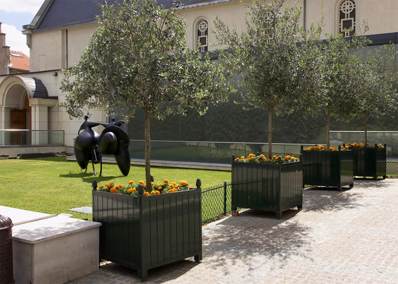 Moveable planters can accommodate small trees or plantings, and can be placed on lockable casters Moveable planters can accommodate small trees or plantings, and can be placed on lockable casters